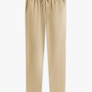 Beige jogger-style pants with a drawstring and elastic waistband, full-length and relaxed fit.