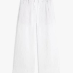 White wide-leg pants with an elastic waistband laid flat, relaxed-fit and lightweight fabric.